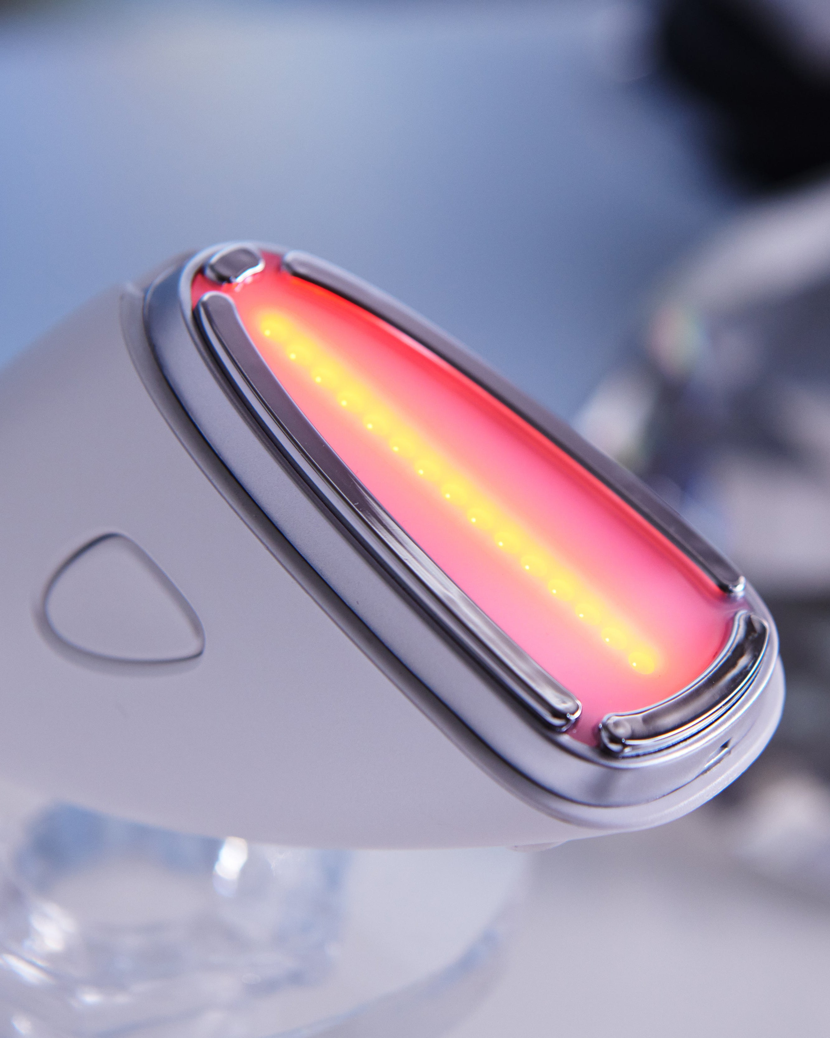 Cell Liner facial device with illuminated LED treatment head