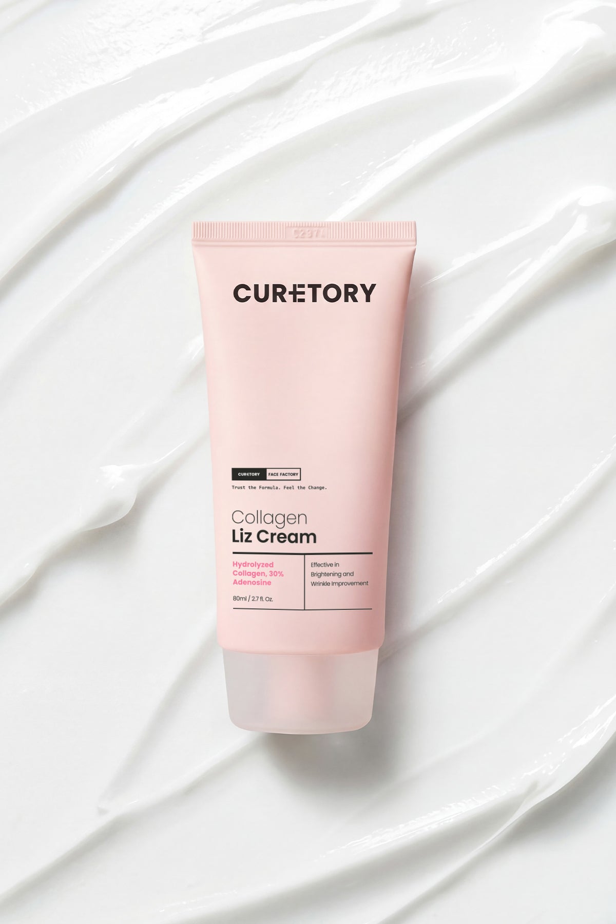 Face Factory Collagen Liz Cream tube on a white fabric background