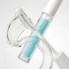 Better Lash Serum applicator with clear serum texture displayed in motion